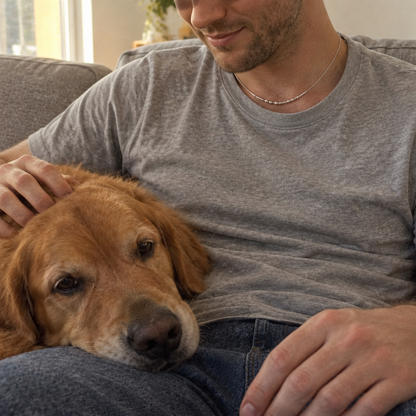 His silver Morse code necklace, a lazy Sunday on the sofa with the dog