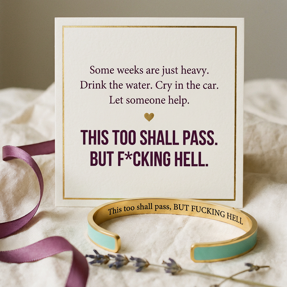 The printed card that comes with the cuff, and the cuff in front of it