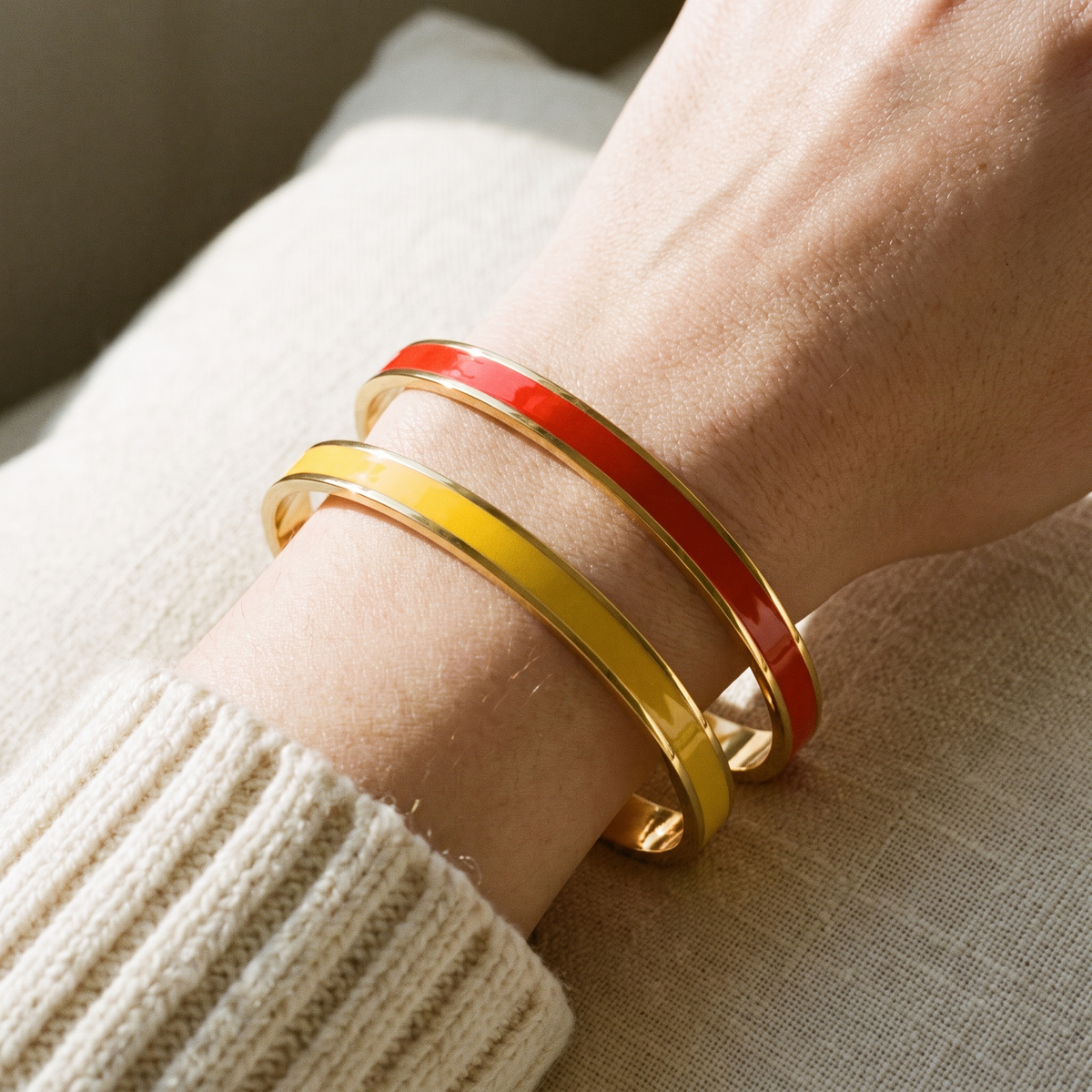 Poppy red and sunny yellow cuffs worn together
