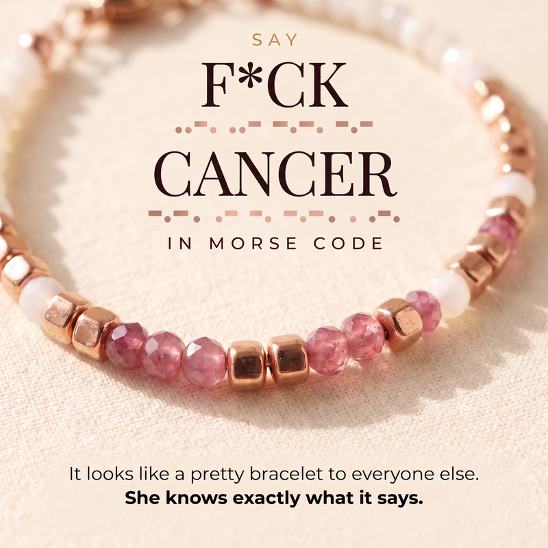 Pink tourmaline and rose gold beaded bracelet on cream fabric, with the words F*ck Cancer in Morse code