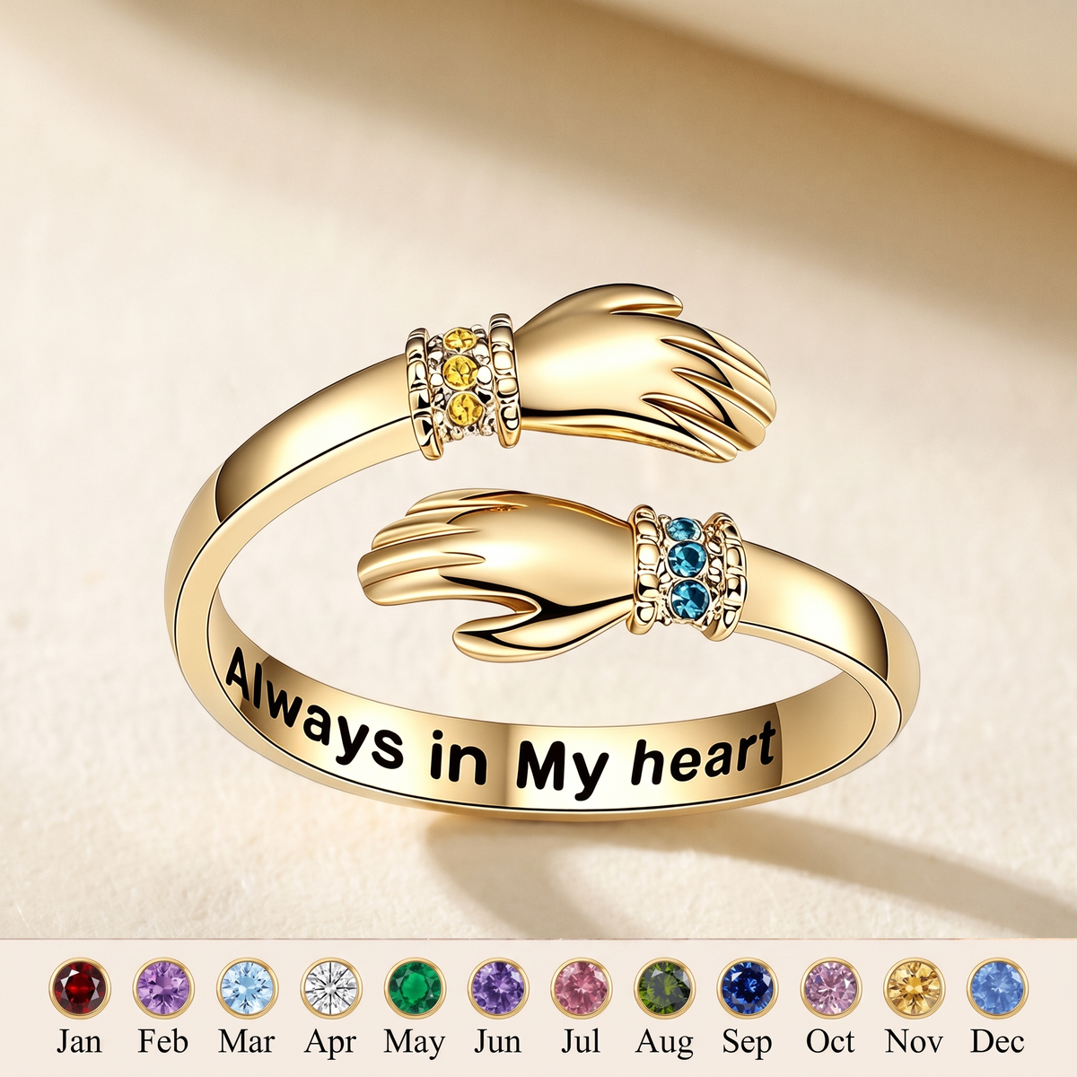The gold ring showing the engraving Always in My heart, with the twelve birthstones below