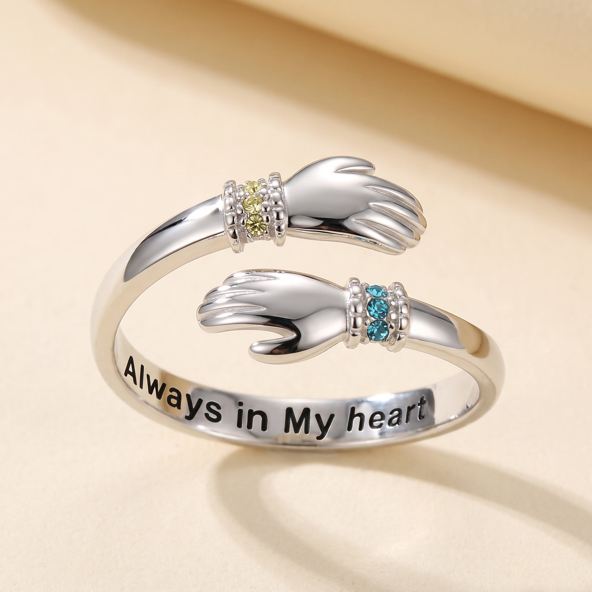 The silver ring showing the engraving Always in My heart