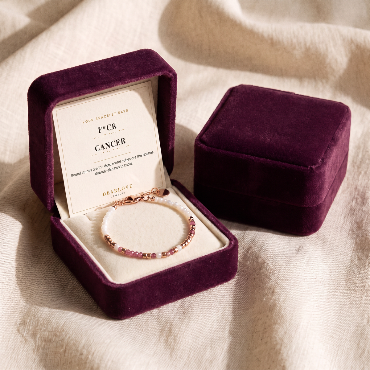 The bracelet in its plum velvet gift box with the card in the lid