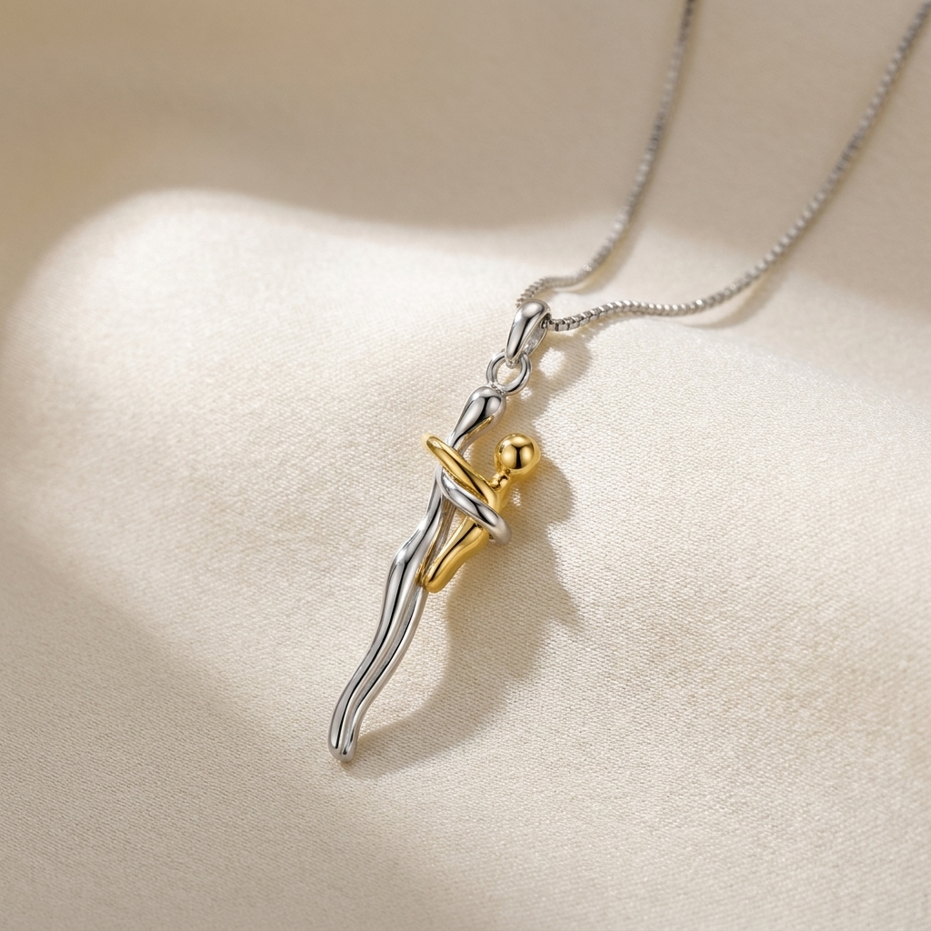 Silver and gold hug necklace on ivory linen