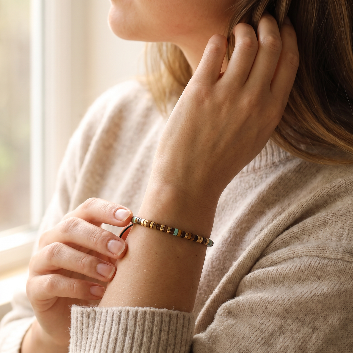 The tiger eye Morse code bracelet worn on the wrist