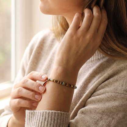 The tiger eye Morse code bracelet worn on the wrist