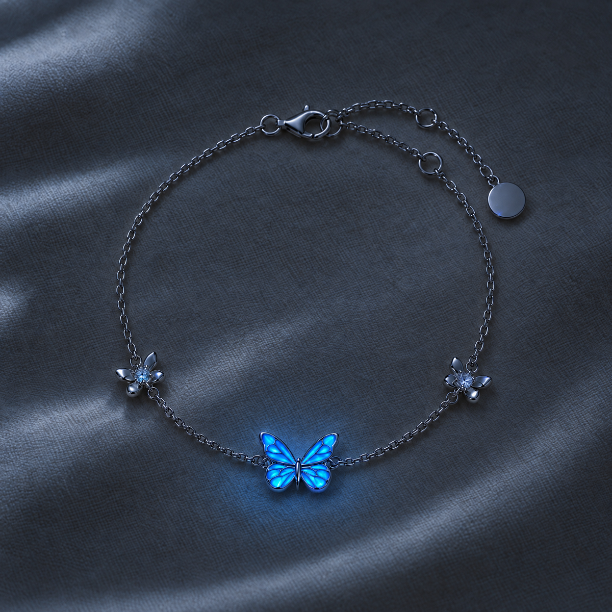 The same bracelet in the dark, the butterfly glowing blue