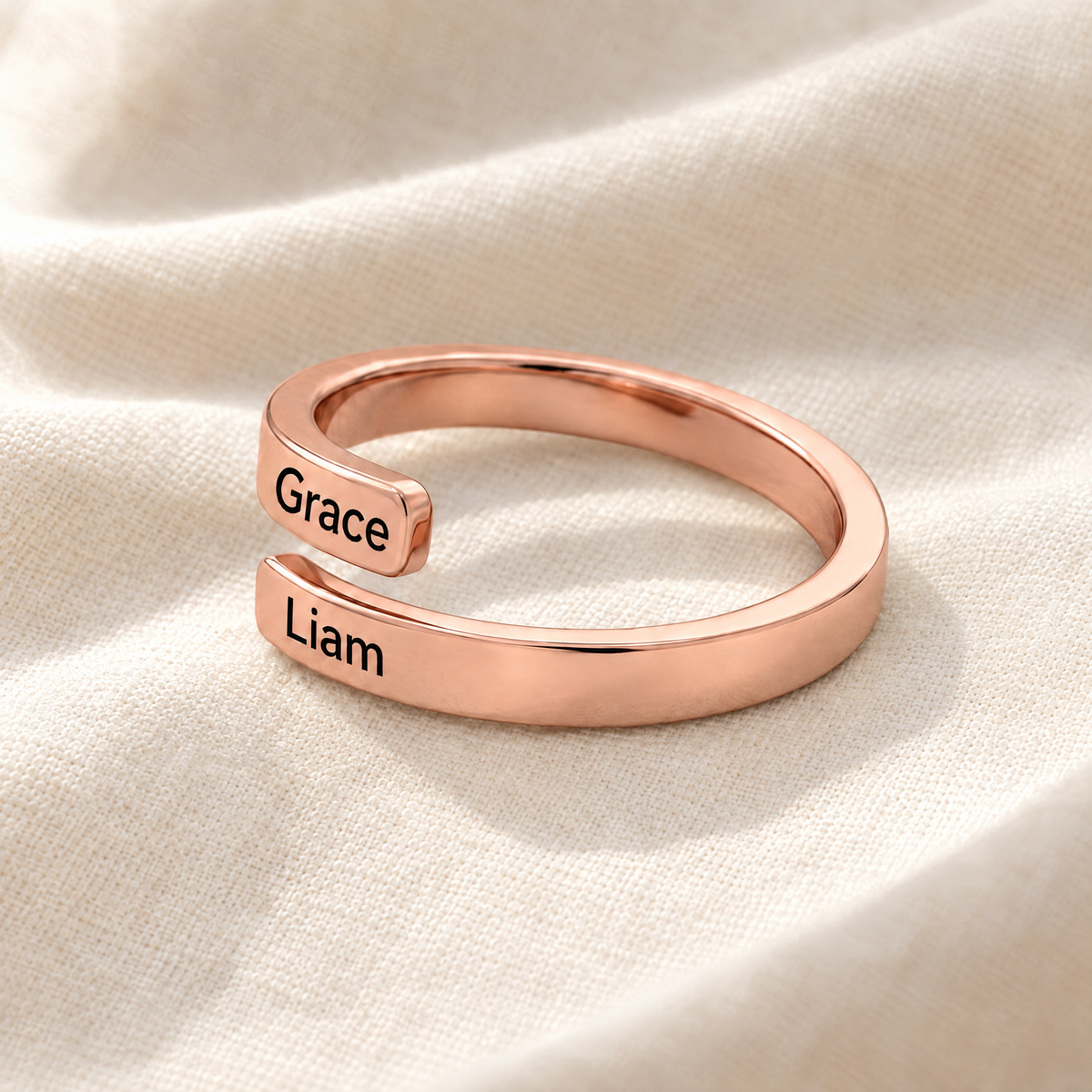 Rose gold open wrap ring engraved Grace and Liam