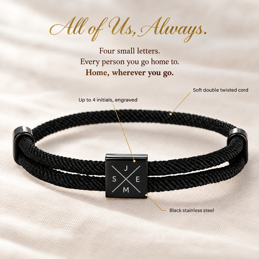 Black cord bracelet with a square black plate engraved with four initials around a fine cross