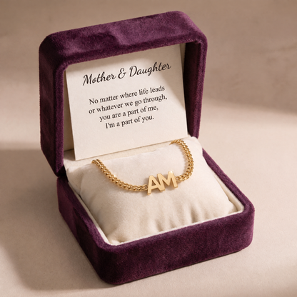 Yours & Mine bracelet in its plum velvet gift box with a Mother & Daughter card