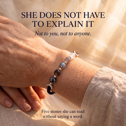 Moon phases crystal bracelet worn on a wrist in warm afternoon light