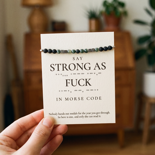 The printed card that comes in the box, held in hand