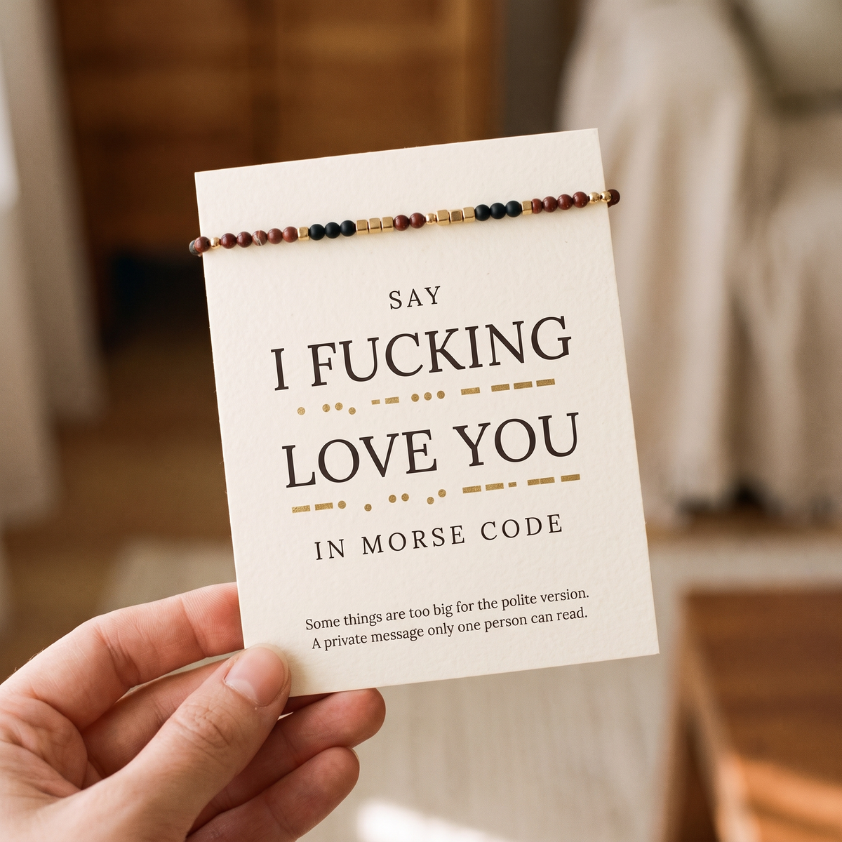 The printed decoder card that comes in the box, held in hand