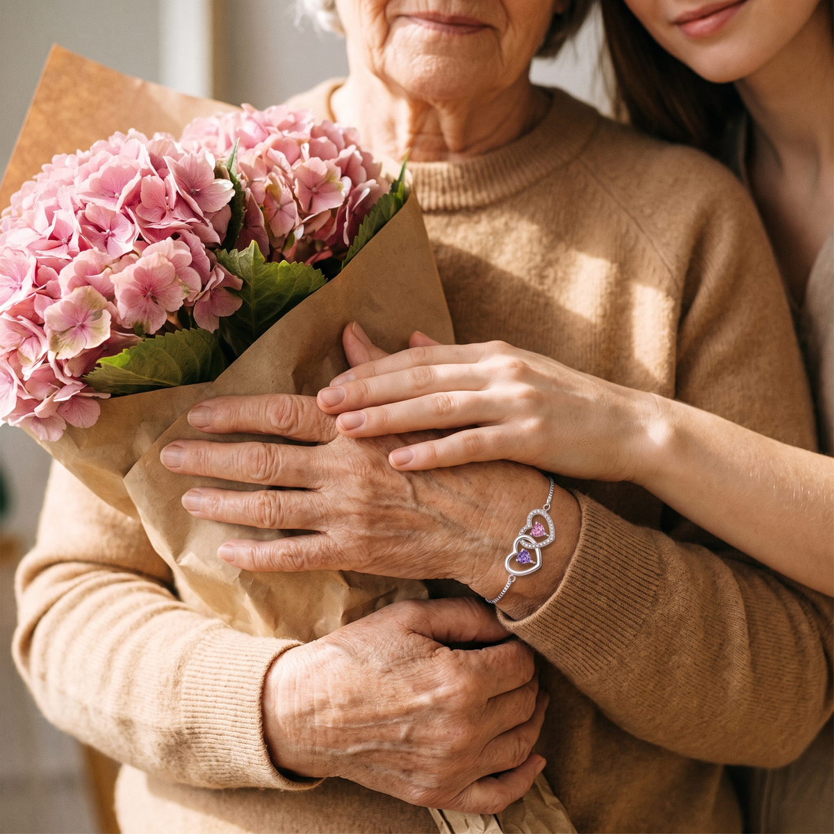 A mother holding flowers, her daughter's hands over hers