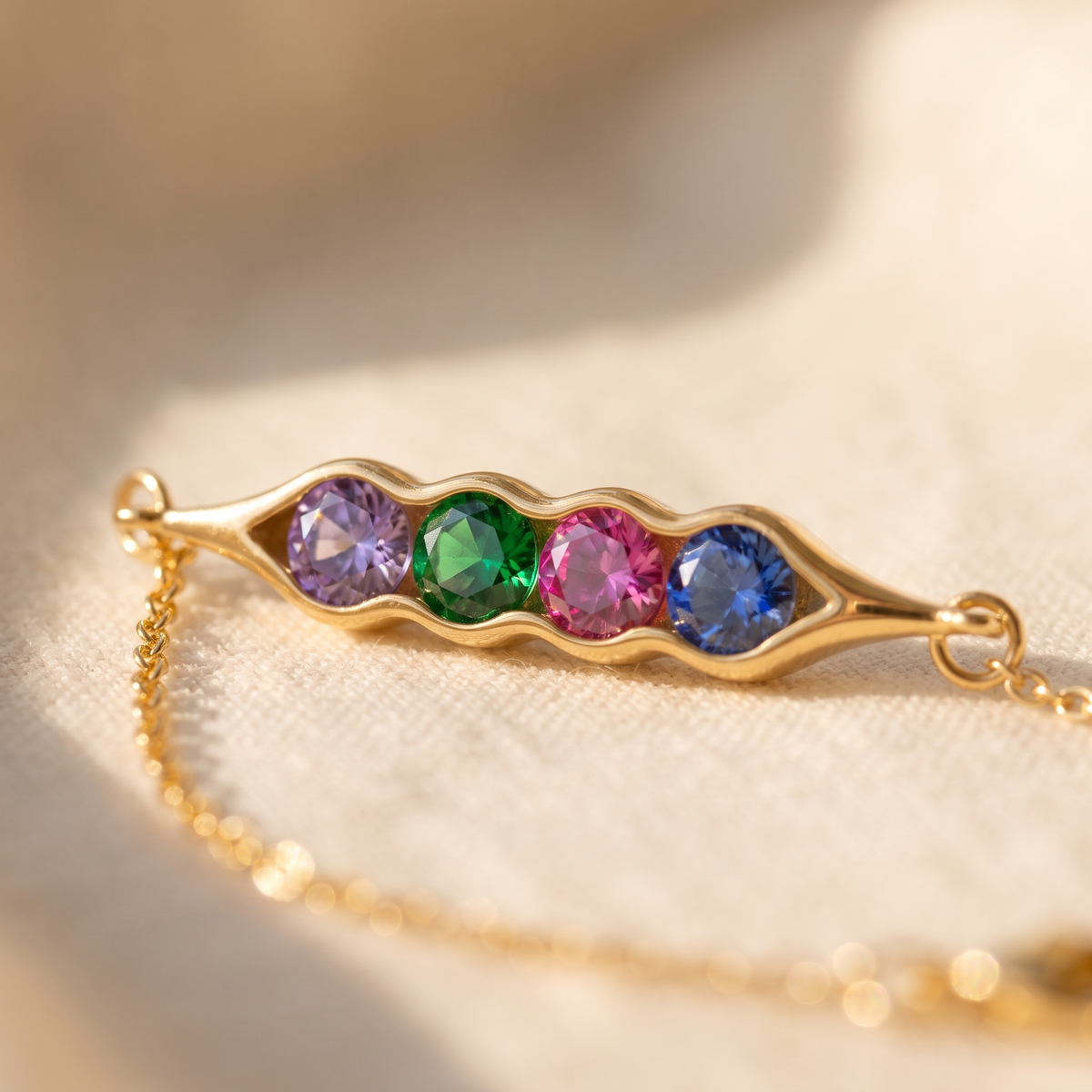 Macro of the pod and its four birthstones