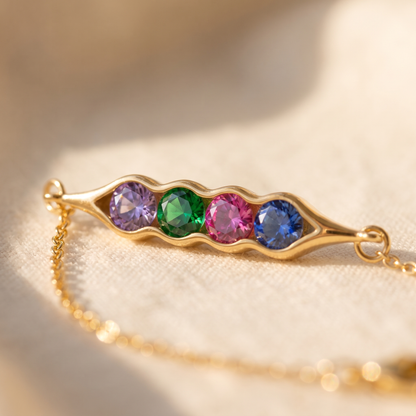 Macro of the pod and its four birthstones