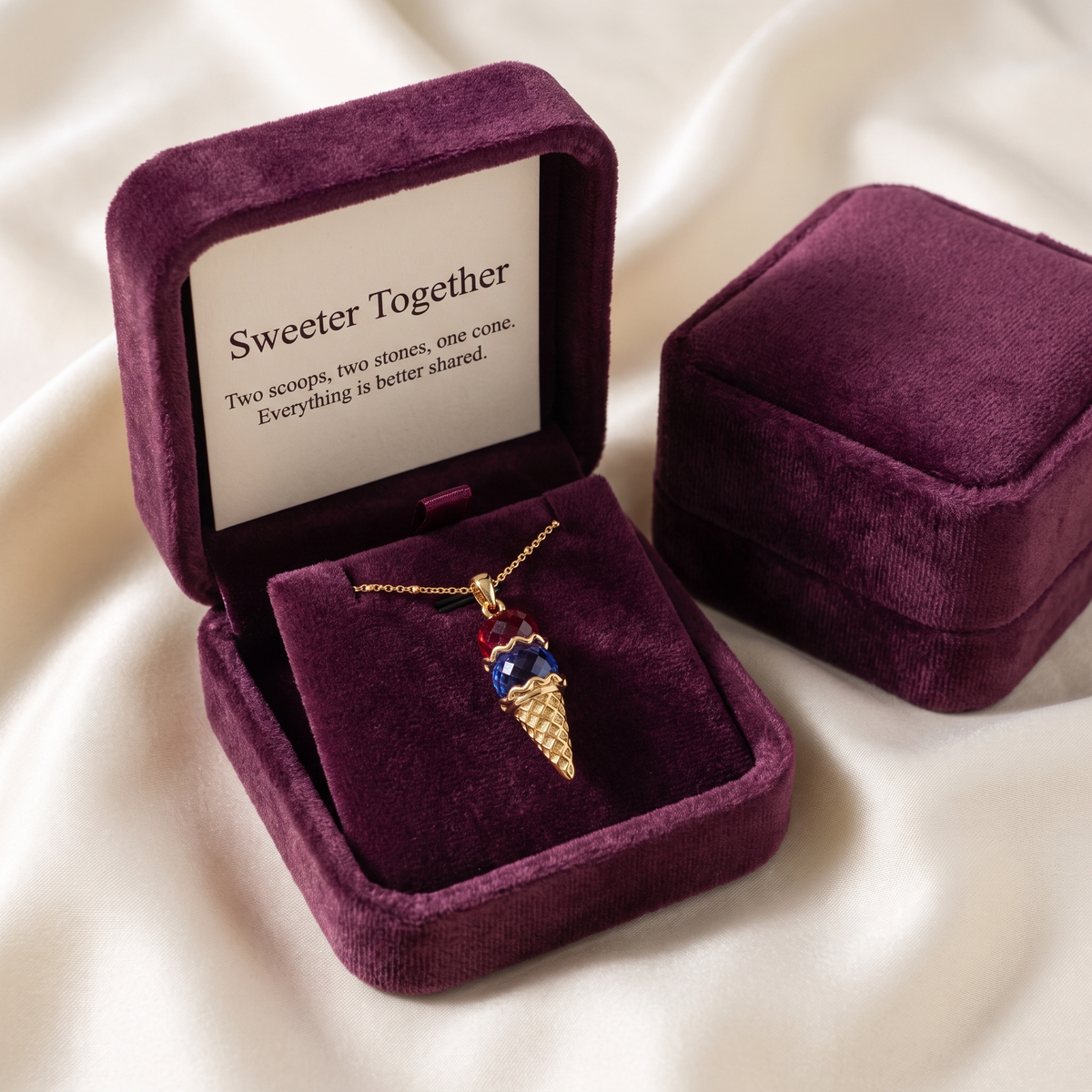 The pendant in its gift box with the keepsake card