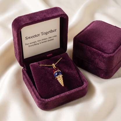 The pendant in its gift box with the keepsake card